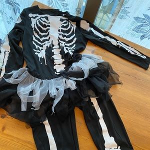 Kids 7/8 skeleton costume. Worn once.